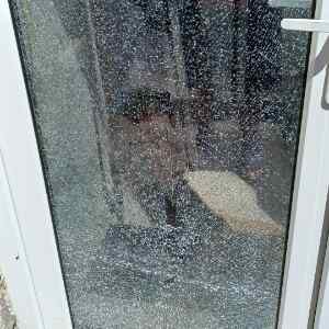 Broken door glass which was repaired by us