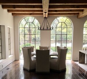 Arched custom windows in a Tuscan style home located in  Mosman NSW